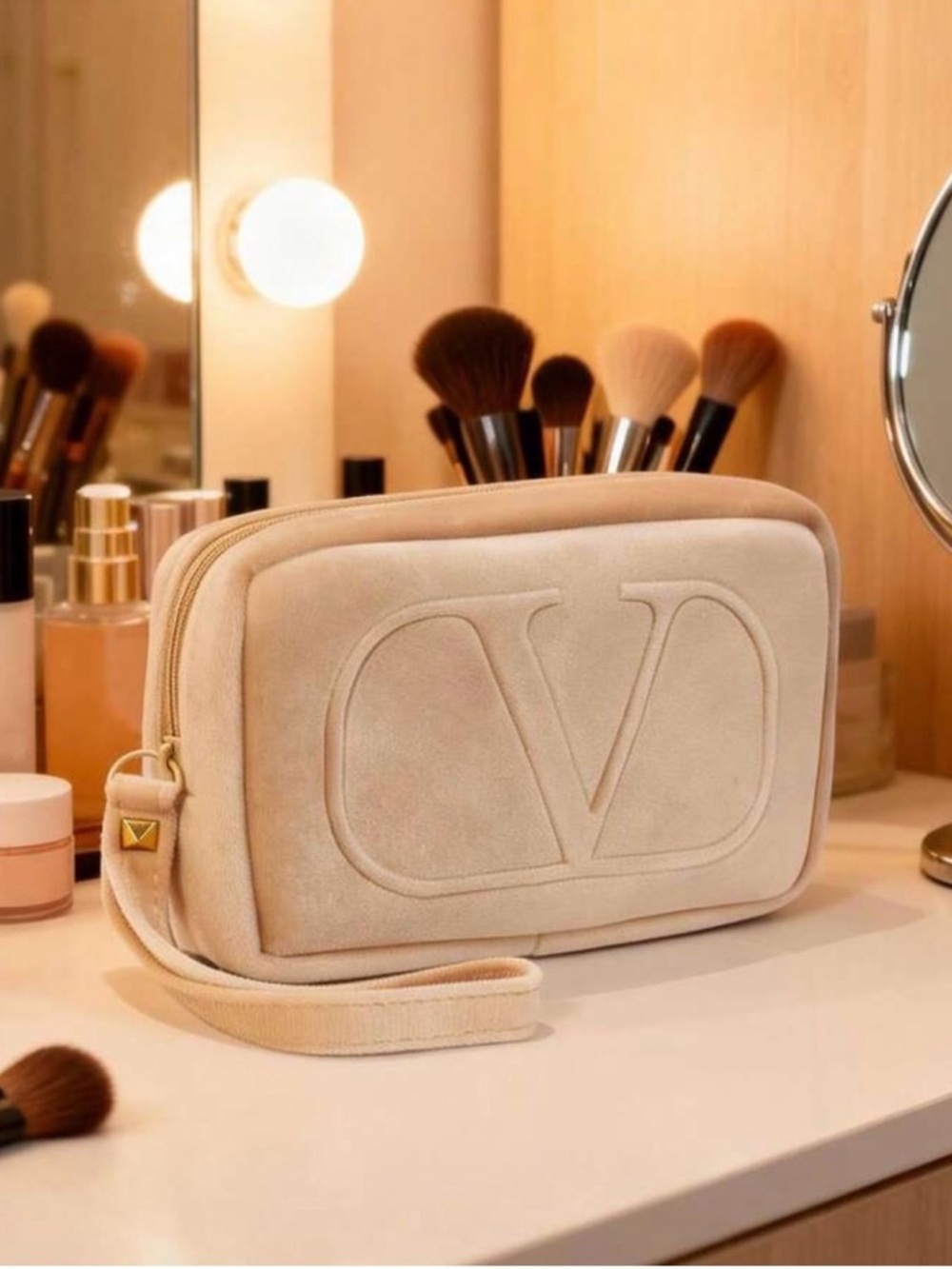 Valentino Garavani Cream Embossed V Wristlet Pouch